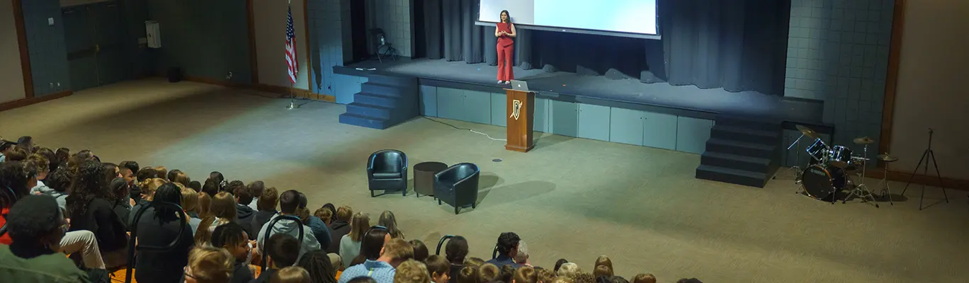 Dr. Nidhi Gupta speaking to a school audience