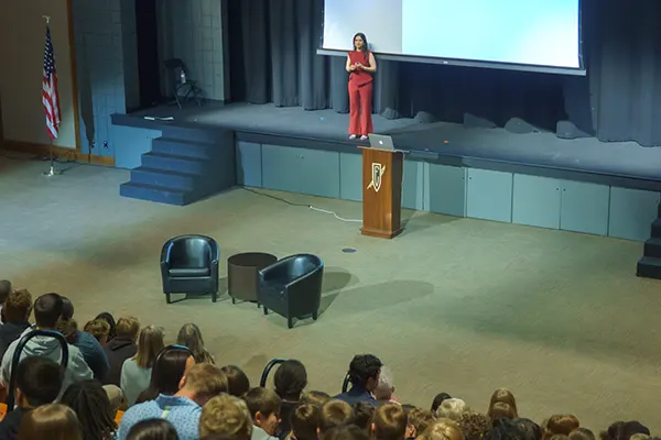 Dr. Nidhi Gupta speaking to a school audience